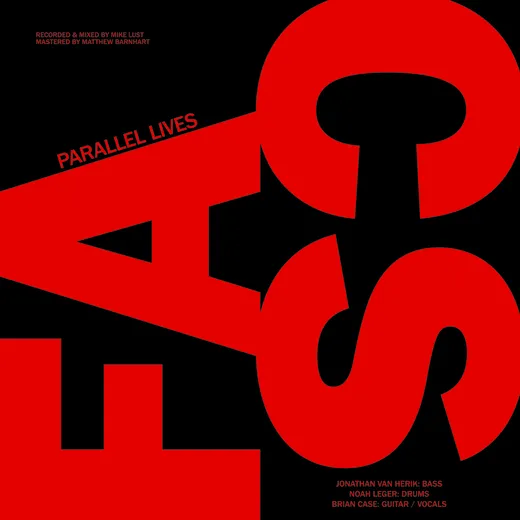 Parallel Lives b/w Red Chair